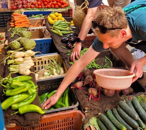 Marrakech food market tour with fresh Moroccan vegetables and spices